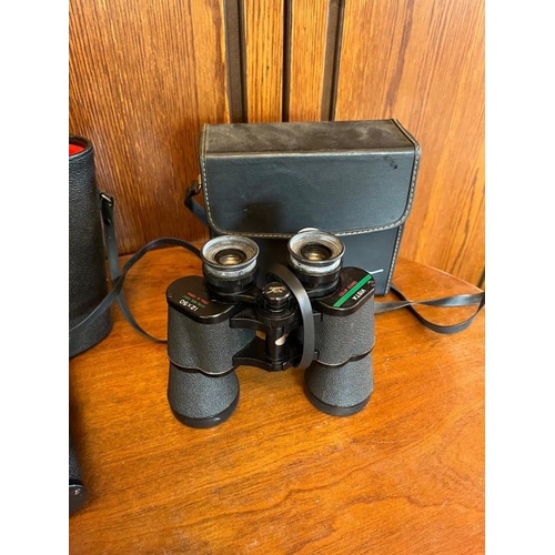 925u - Prinz binoculars cased and another pair.