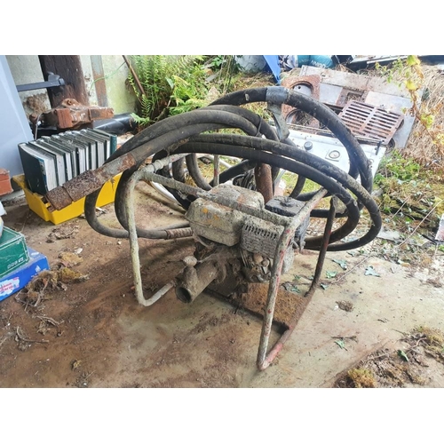 93 - Concrete spreader and pokers in working condition.