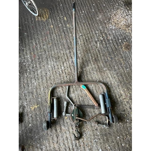 958 - Snatchblock pulley, saw, wheel brace and a lorry wheel trolley.