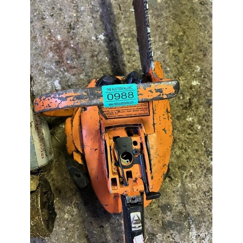 988 - Homelite vintage chainsaw and Melite chainsaw. {Largest 75 cm L}