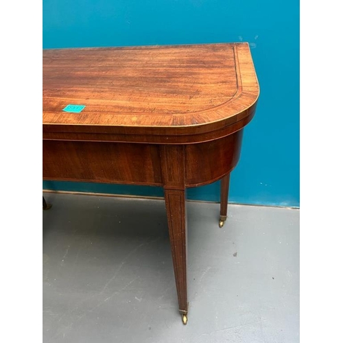 313 - Georgian Mahogany Fold over Card Table with Rosewood  crossbanded top on 4 tapered legs with brass c... 