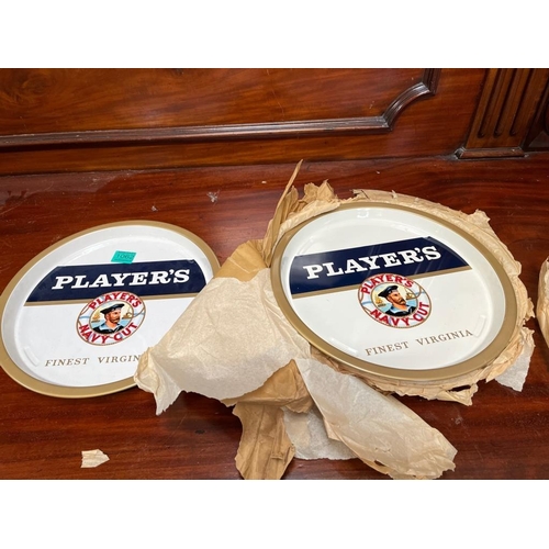 1062 - Collection of 7 Vintage Players Navy Cut Drink Trays (never out of wrapping) (32cm)