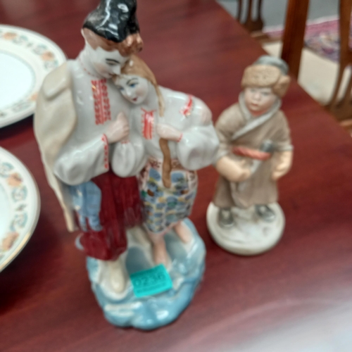 236 - Two Eastern European Porcelain Figures