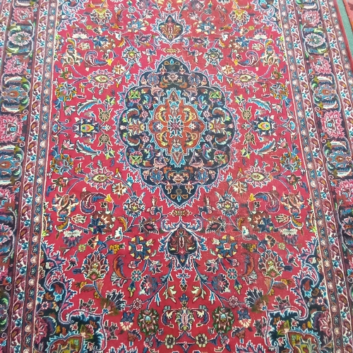 591 - Persian Handwoven Red Ground Carpet (285 x 195cm)