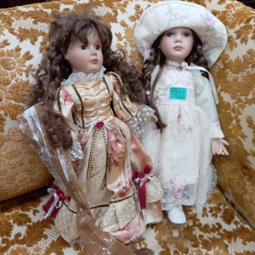 371 - 2 Dolls with porcelain features