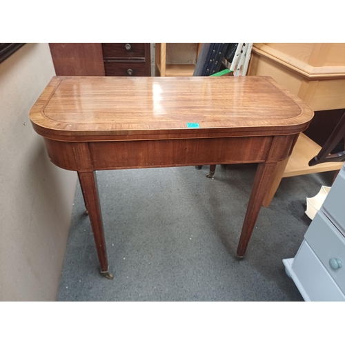 94 - Georgian Mahogany Games Table Inlaid and Cross banded with Rosewood on tapered legs