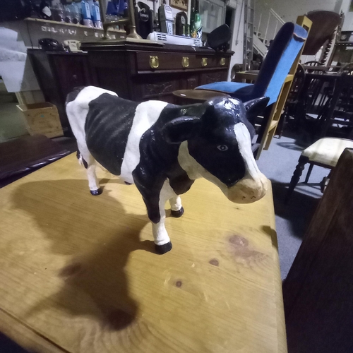 433 - Cast Iron Figure of a Freisan Cow