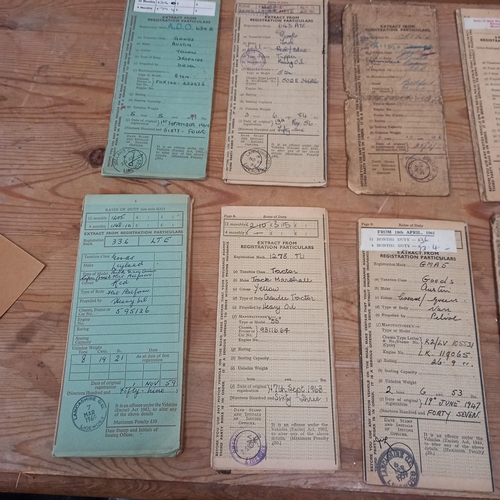 105 - Collection of old Vehicle Registration Books (14) - (in cabinet)