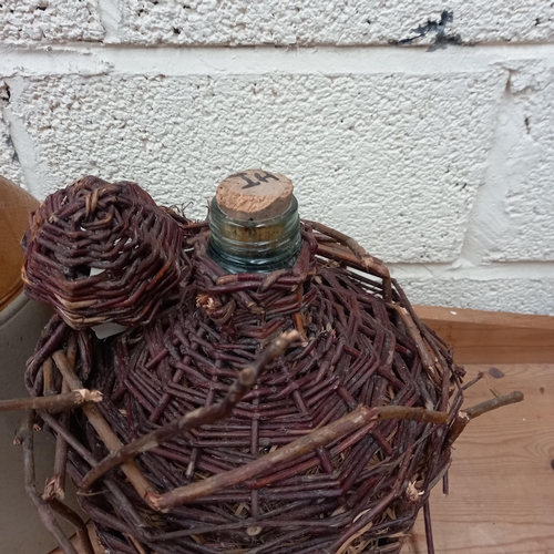 118 - Two Stoneware Whiskey Crocks and a Glass Syphon in Wicker Case