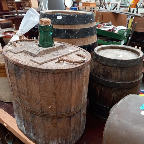 125 - 2 old Iron Bound Sherry Barrells and a Timber Cased Glass Bottle