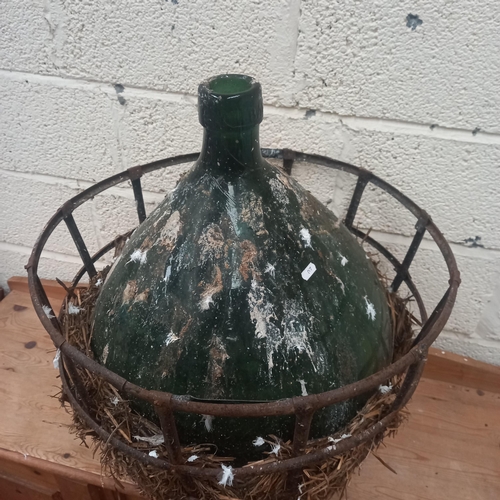 229 - Large old Green Glass Bottle in Metal Carry Case Stamped 