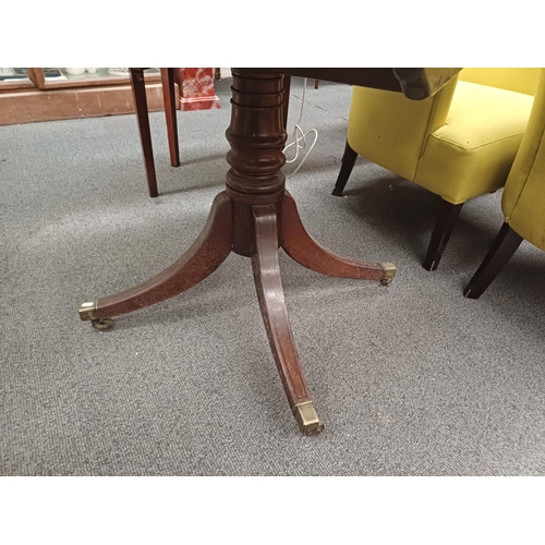 713 - Georgian Mahogany Oval Centre Table with Crossbanded Top on a turned column and 4 splayed legs