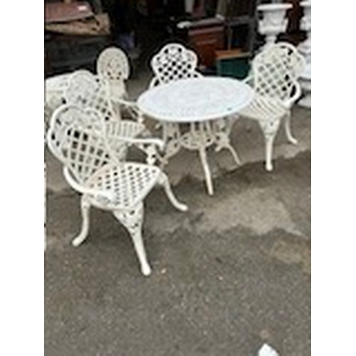 969 - Heavy Cast Iron Garden or Patio Table and 4 matching Heavy Cast Iron Armchairs