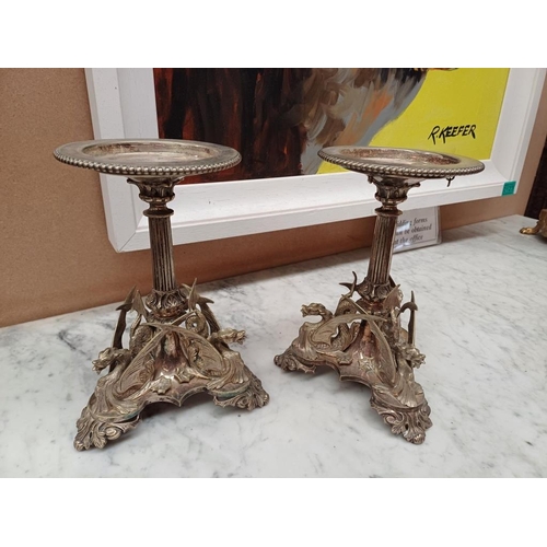 126 - Pair of Ornate Silver Plate Candle Stands on Griffin Decorated Columns (22cm)