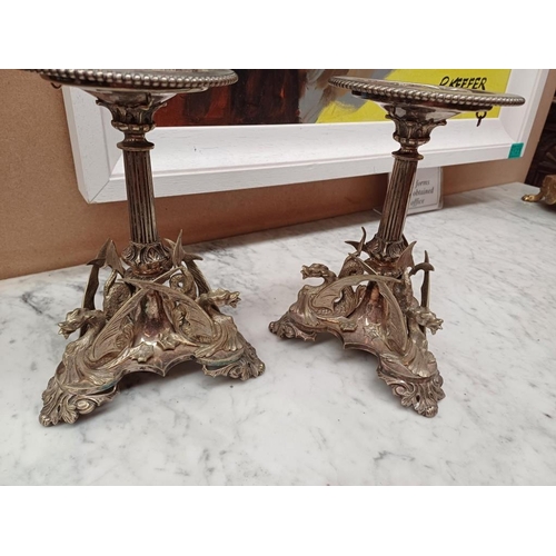 126 - Pair of Ornate Silver Plate Candle Stands on Griffin Decorated Columns (22cm)