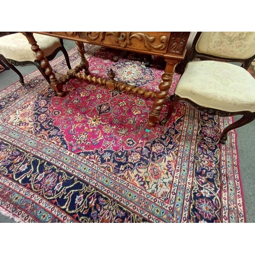 264 - Persian Handwoven Red Ground Carpet of Traditional Medallion Pattern Design (343cm x 245cm)