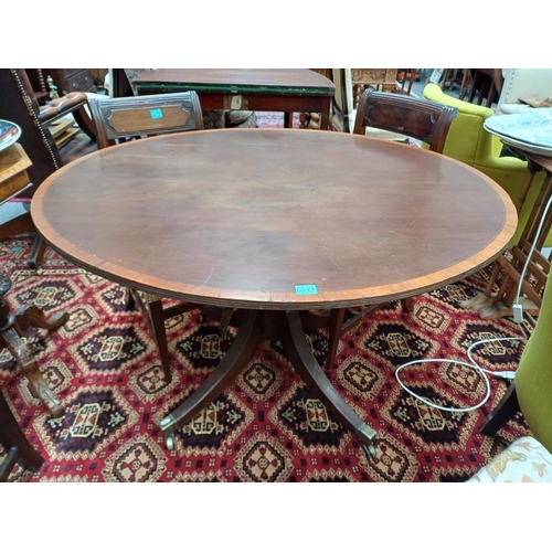 271 - Georgian Mahogany Oval Centre Table with Cross-banded Top on a turned column and 4 splayed legs