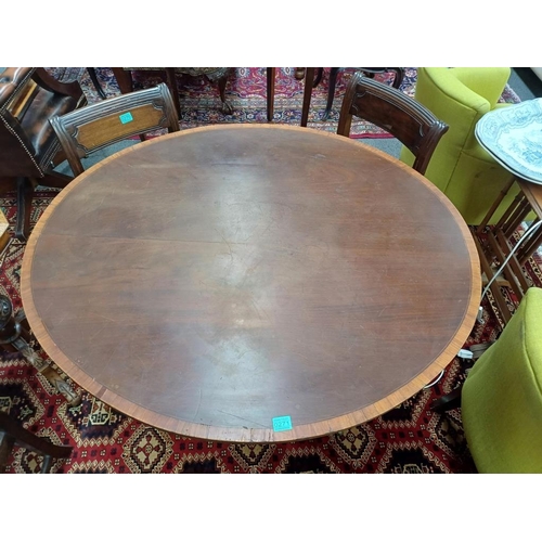 271 - Georgian Mahogany Oval Centre Table with Cross-banded Top on a turned column and 4 splayed legs