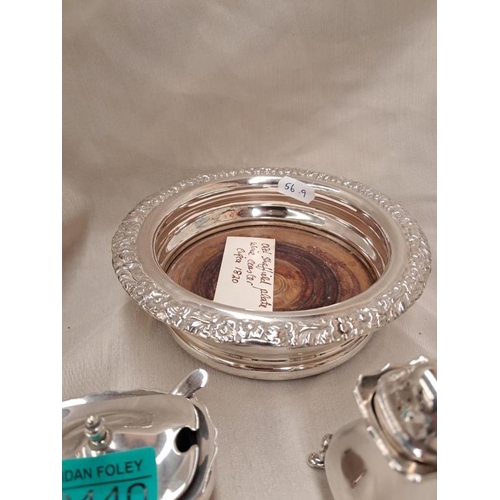 440 - Antique Silver Plated Wine Coaster together with a Silver Plated Condiment Set