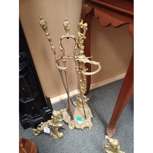 97 - Pair of Brass Andirons together with a Set of Brass Fire Irons on Stand