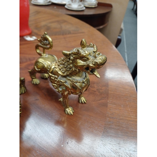 615 - Decorative Pair of Brass Oriental Dog Figures