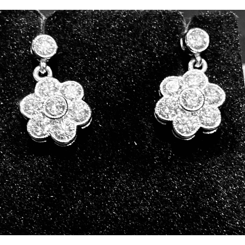 294 - 18 Carat White Gold Daisy Drop Earrings.  Diamonds appox 1.40 carats, Colour G. Clarity VS2