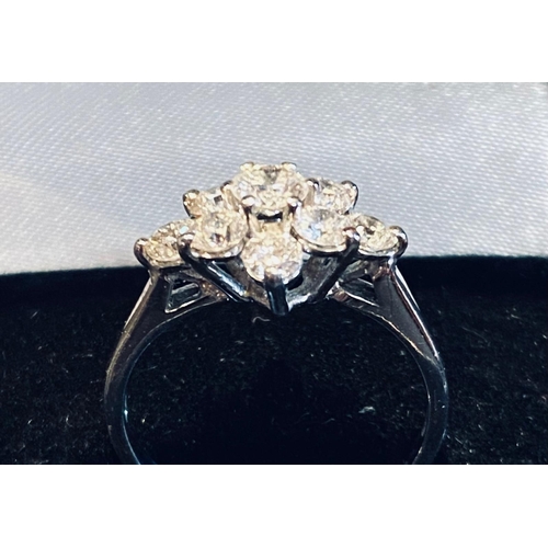 302 - 18 Carat White Gold 9 Stone Diamond Cluster Ring. Diamonds approx 1.50carats.  Colour F. Clarity VS2... 