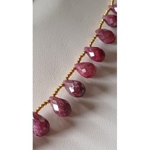 555 - Ruby Necklace approx 18 inches, 27 Faceted Rubies, - 135.80 carats together with Certificate of auth... 