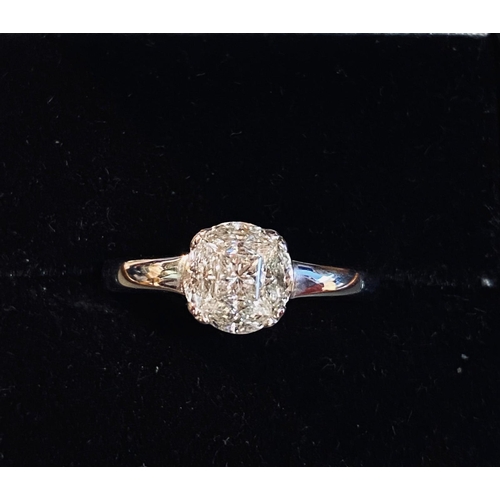 557 - 18 carat White Gold Diamond Cluster Ring.  Approx .90 carats.  Colour G, Clarity VS2.  Ring Size M