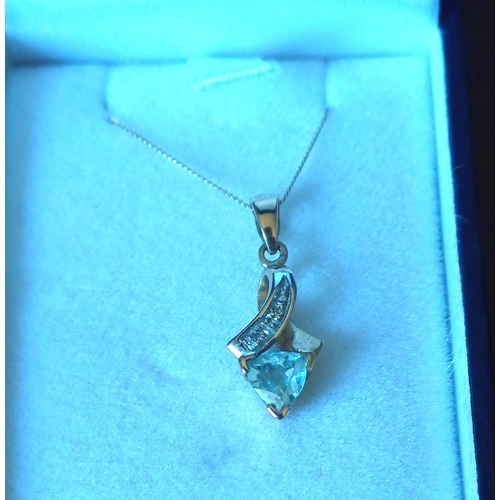 427 - 9 Carat Diamond Trillion Cut Aquamarine Pendant and Chain