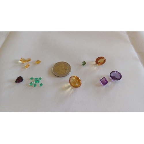 568 - Collection of precious Stones including Emerald, Citrine, Garnet and Amethyst