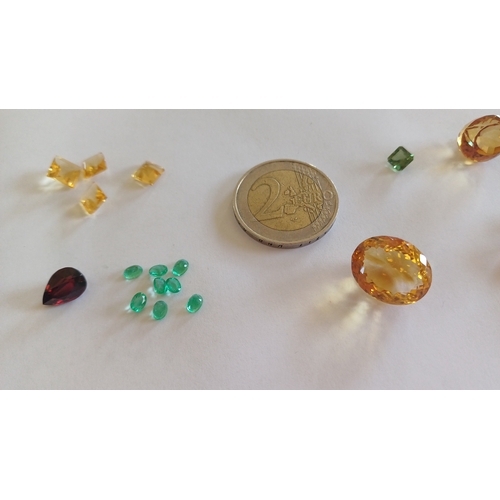 568 - Collection of precious Stones including Emerald, Citrine, Garnet and Amethyst