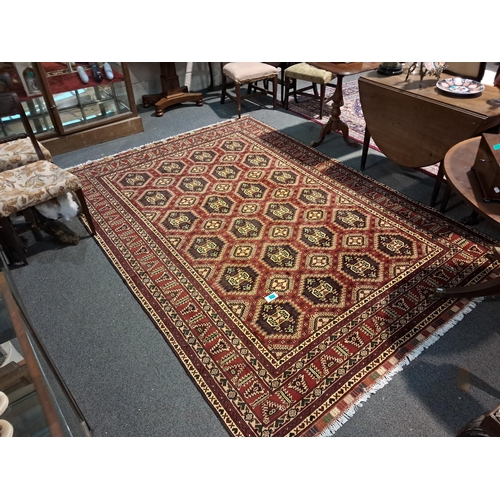 242 - Persian Handwoven Red Ground Tekke Carpet (290cm x 200cm)