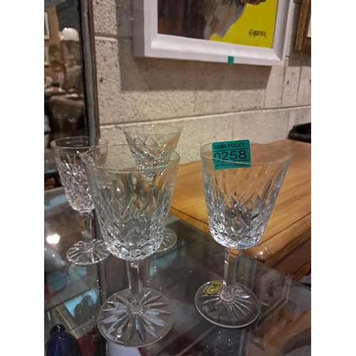 258 - Four Waterford Wine Glasses (various cuts and sizes)