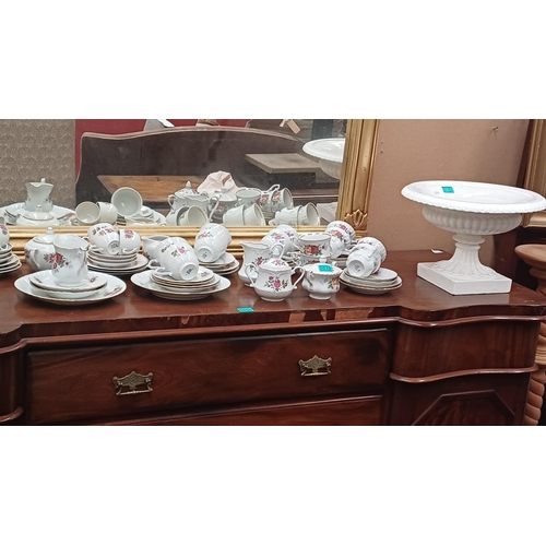 516 - Three Floral Decorated Tea Sets