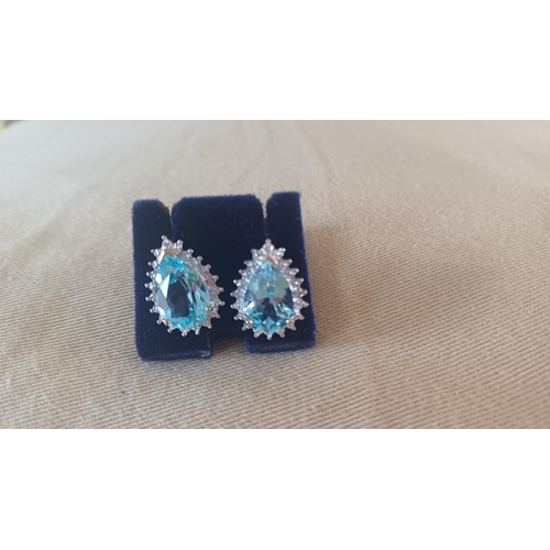 456 - 9 Carat Blue Topaz Cluster & Diamond Earrings