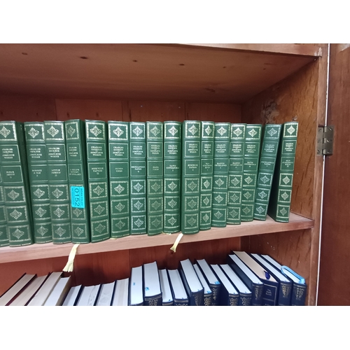 152 - The Complete Works of Charles Dickens (35 Volumes) and others on bottom shelf