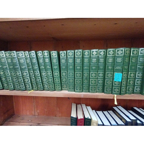 152 - The Complete Works of Charles Dickens (35 Volumes) and others on bottom shelf