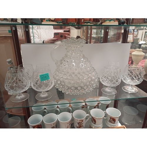 63 - Dimple Glass Jug and Bowl Set together with 7 Brandy Glasses (5 + 2)