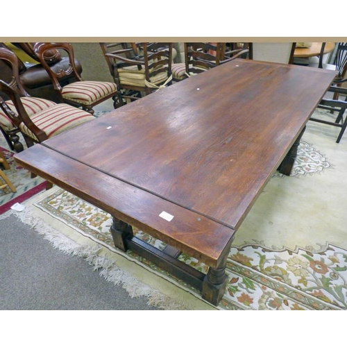 50 - 20TH CENTURY OAK REFECTORY TABLE WITH TURNED SUPPORTS 200CM LONG