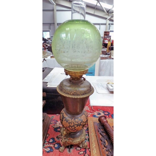 1300 - ARTS & CRAFTS STYLE LAMP WITH GREEN GLASS GLOBE AND HEAVY BRASS LIONS PAW BASE