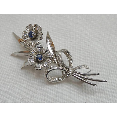 141 - 18CT GOLD SAPPHIRE & DIAMOND SET FLORAL BROOCH - 5.5CM