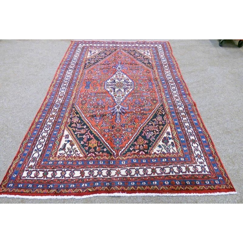 1421 - RED GROUND PERSIAN SAROUK VILLAGE CARPET WITH TRADITIONAL DESIGN 205 X 300 CM