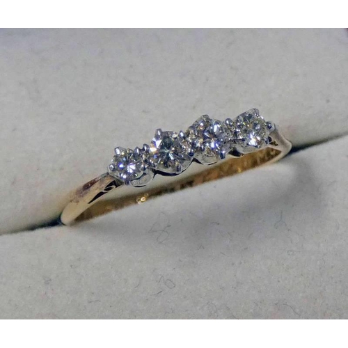 221 - DIAMOND SET 4 STONE RING MARKED 18CT & PLAT.