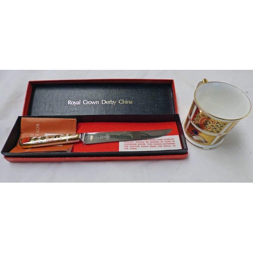 3268 - ROYAL CROWN DERBY CAKE KNIFE IN BOX AS NEW & ROYAL CROWN DERBY MILLENNIUM 2000 MUG