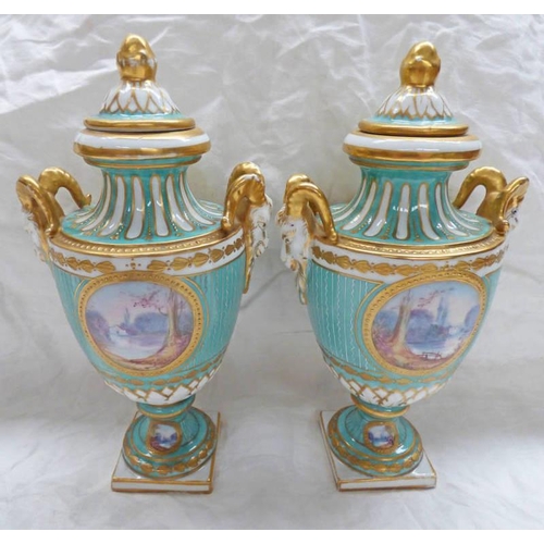 3322 - PAIR OF CONTINENTAL PORCELAIN PALE GREEN LIDDED VASES WITH TWIN GOATS MASK HANDLES ON SQUARE BASES  ... 