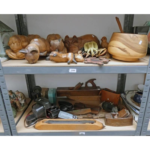 3388 - SELECTION OF CARVED WOODEN CATS, 2 PLANES - 1 STAMPED G.FAWCETT, PRAKTICA CAMERA ETC ON 2 SHELVES