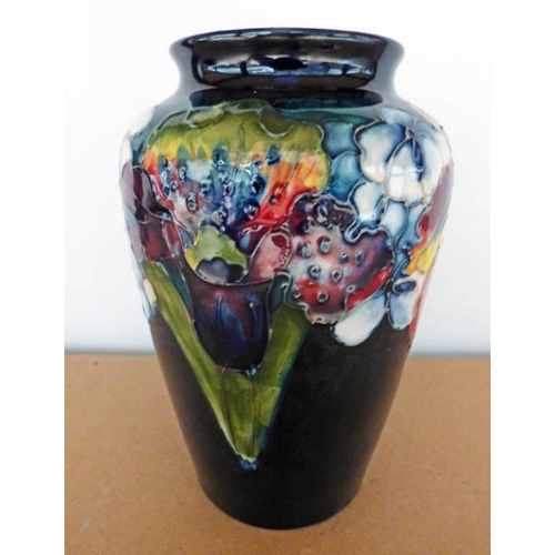 3394 - MOORCROFT VASE DECORATED WITH ORCHID & SPRING FLOWERS, MARKED 'MADE IN ENGLAND', 15.5CM TALL