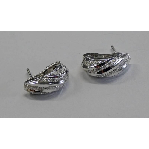 450A - PAIR DIAMOND SET EAR CLIPS SET IN WHITE GOLD MARKED 750