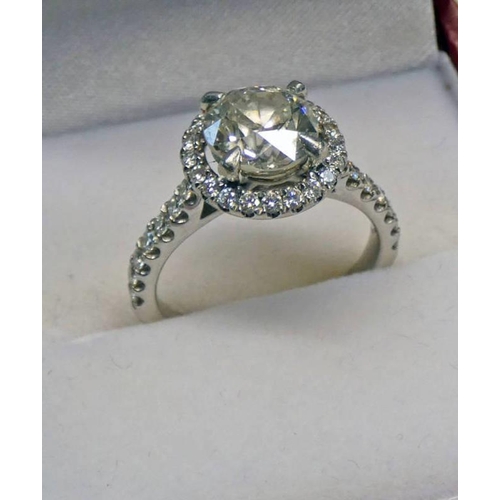 465 - DIAMOND SINGLE STONE RING, THE OLD BRILLIANT CUT DIAMOND APPROX. 2.00 CARATS SET WITHIN A SURROUND O... 